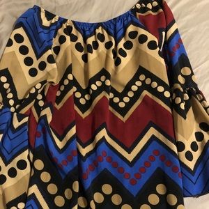 Red, royal, tan, black blouse
